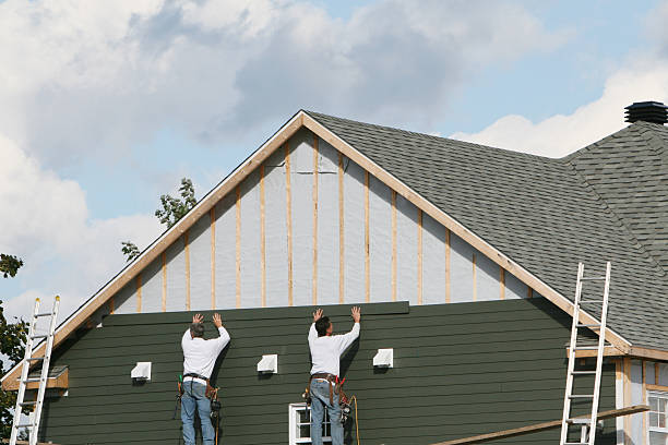 Professional Siding Contractor technician working in Trinway, OH